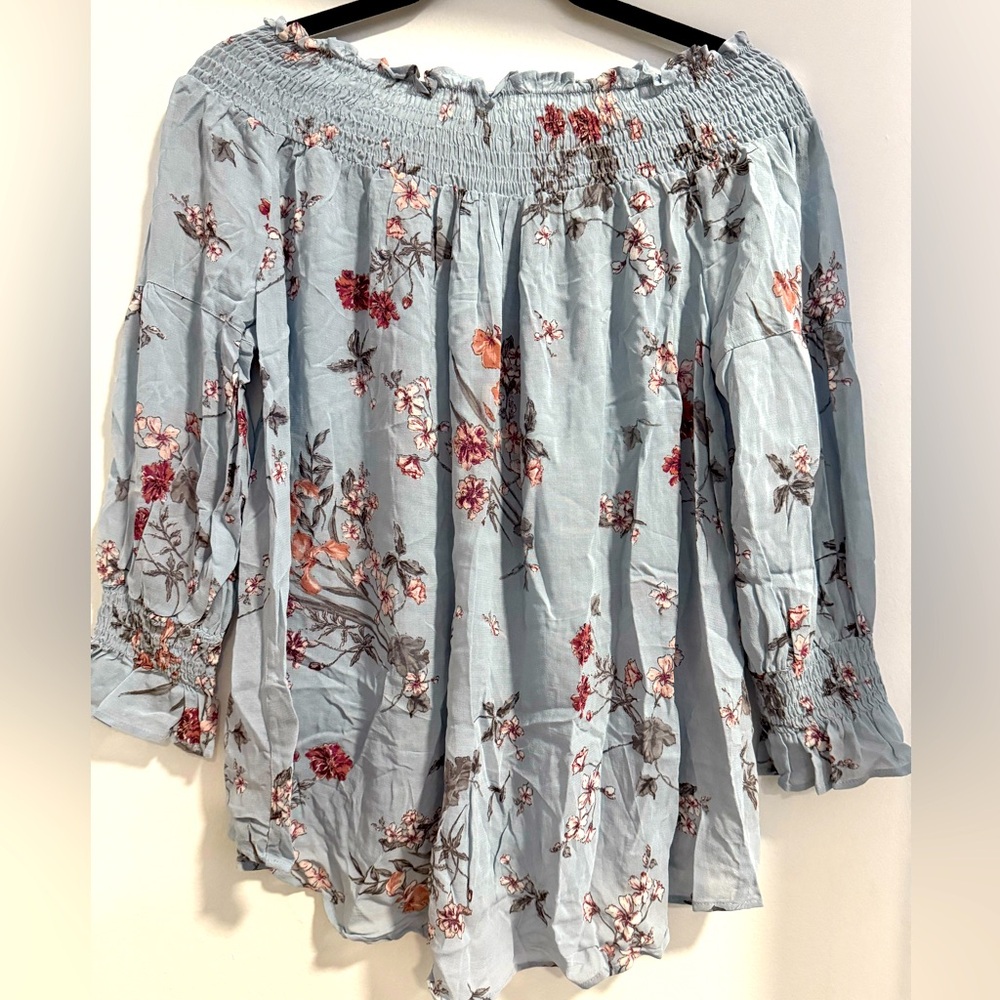 Off the shoulder, floral shirt by Zara Women Premium Denim Collection.
